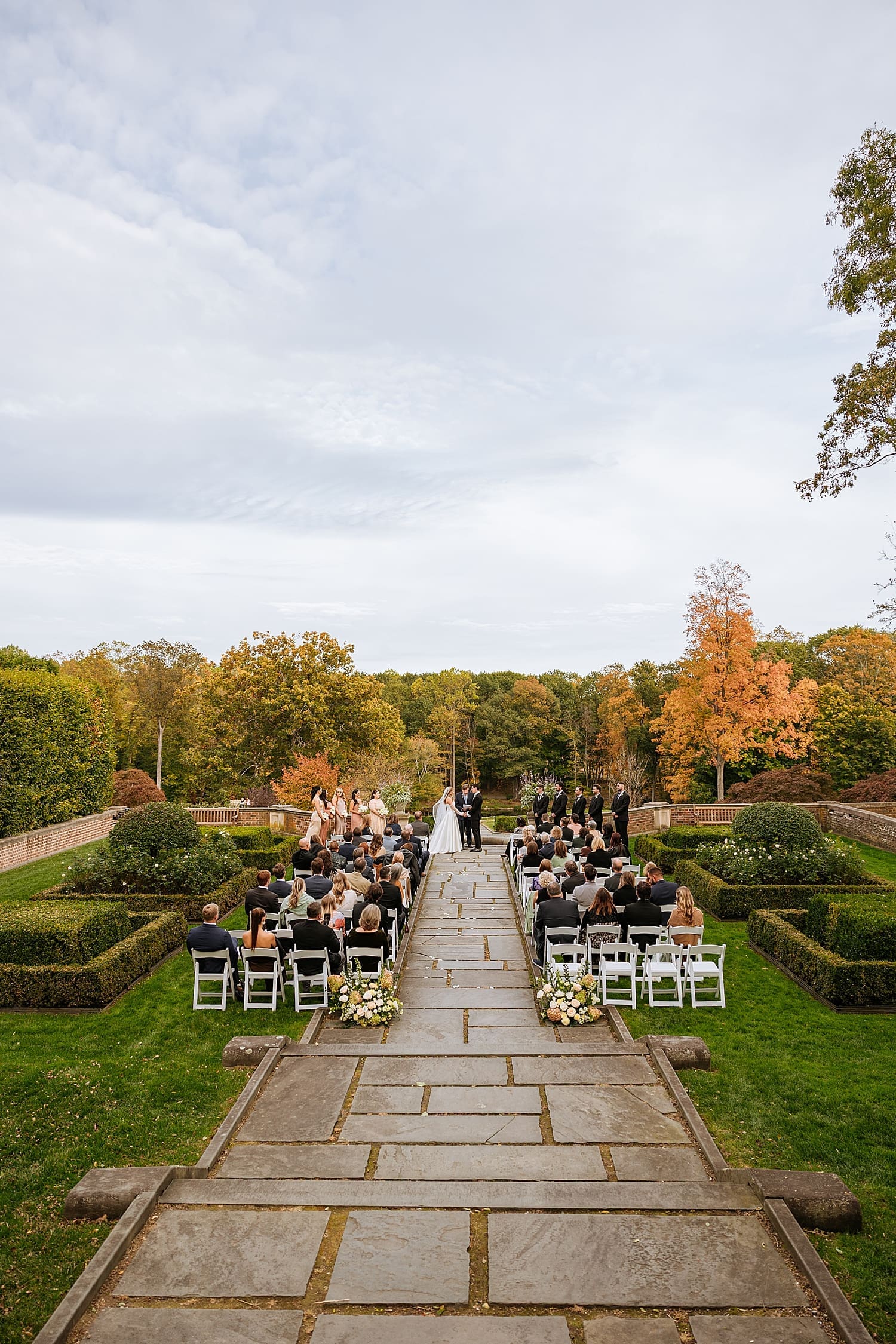 ceremony on the sprawling lawn by Kelly Jean Photography
