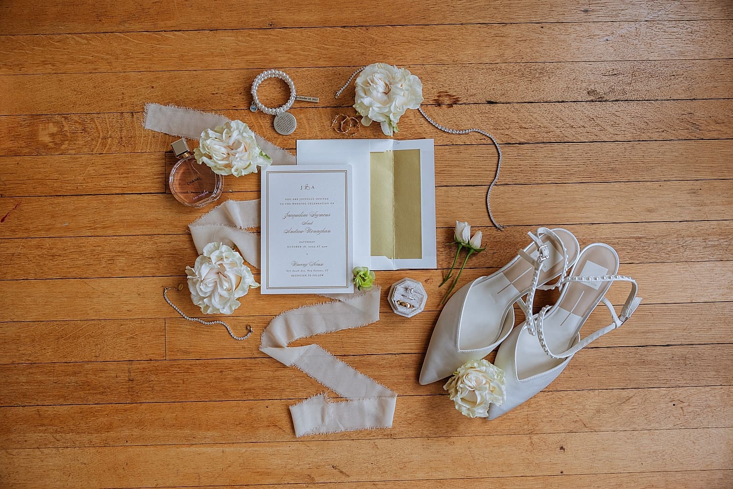 invitation suite on hardwood floors at Waveny House