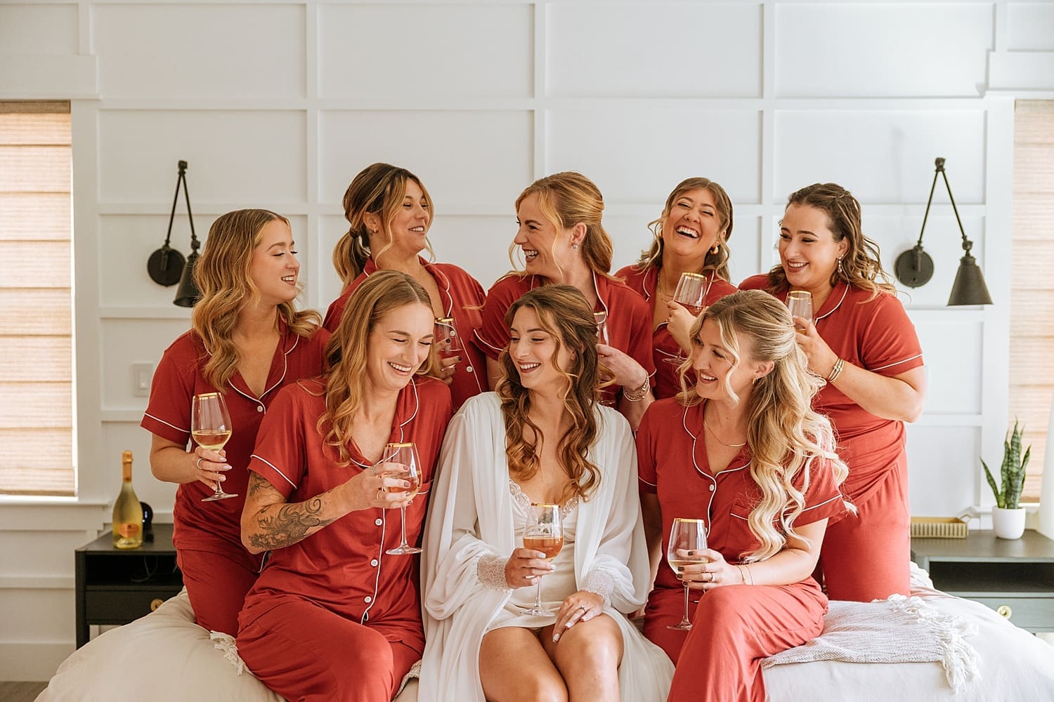 bride surrounded bridesmaids at Fall Venues in the Hudson Valley